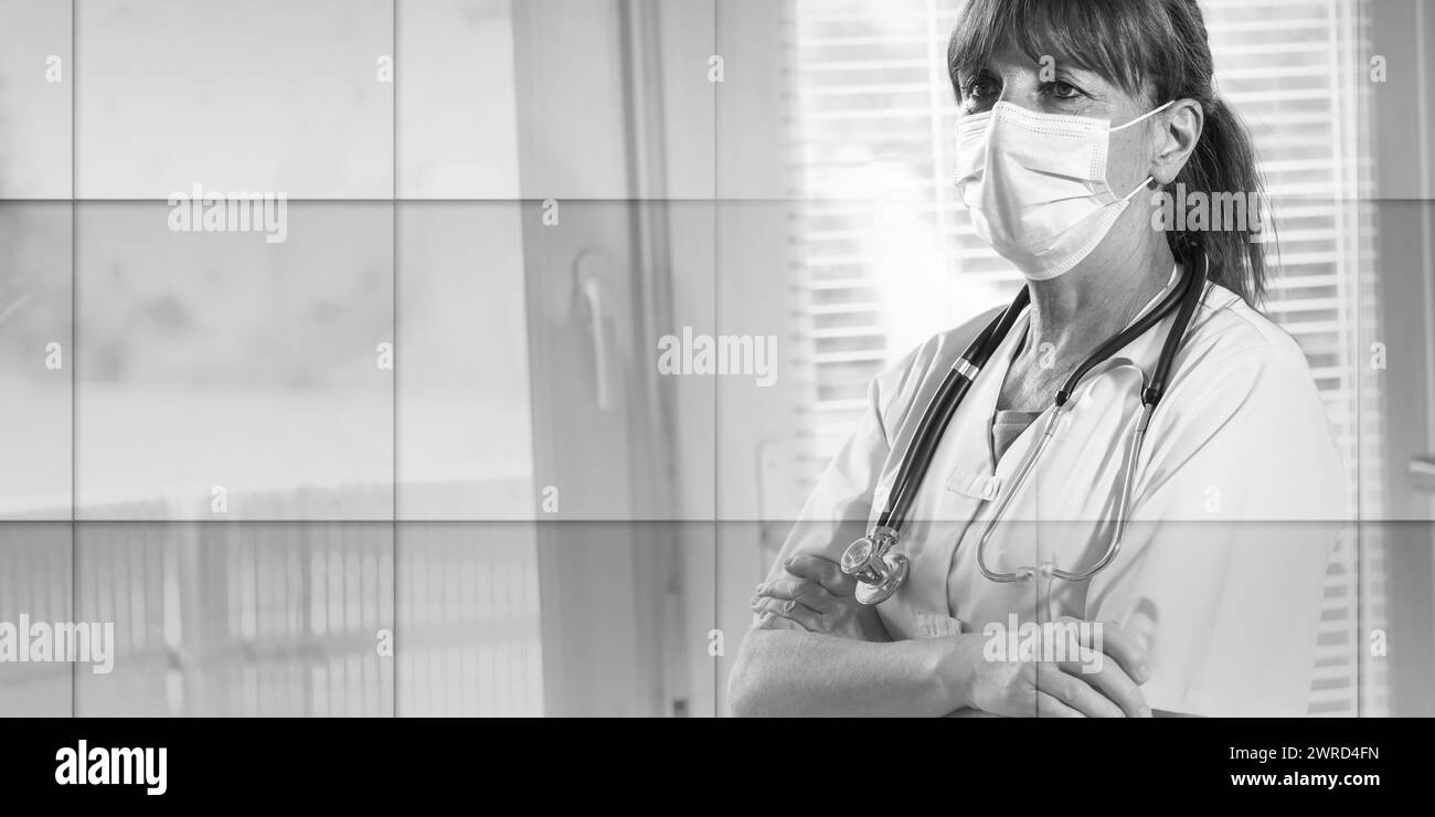 Doctor portrait arms crossed Black and White Stock Photos & Images - Alamy