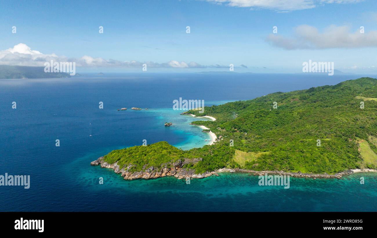 Aerial view of island with greenery trees and beaches. Cobrador Island ...