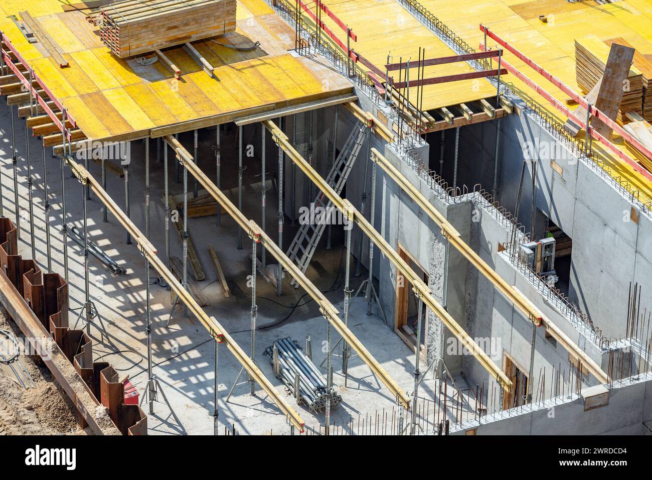 timber formwork beams on concrete walls Stock Photo