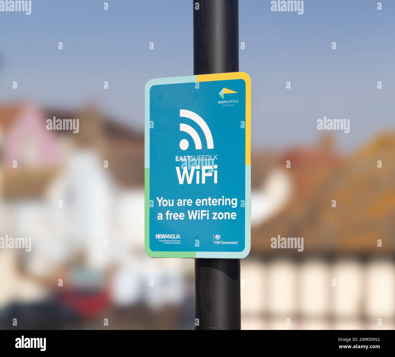 Sign on a post informing the public that they are entering a free wifi zone. Aldeburgh. UK Stock Photo