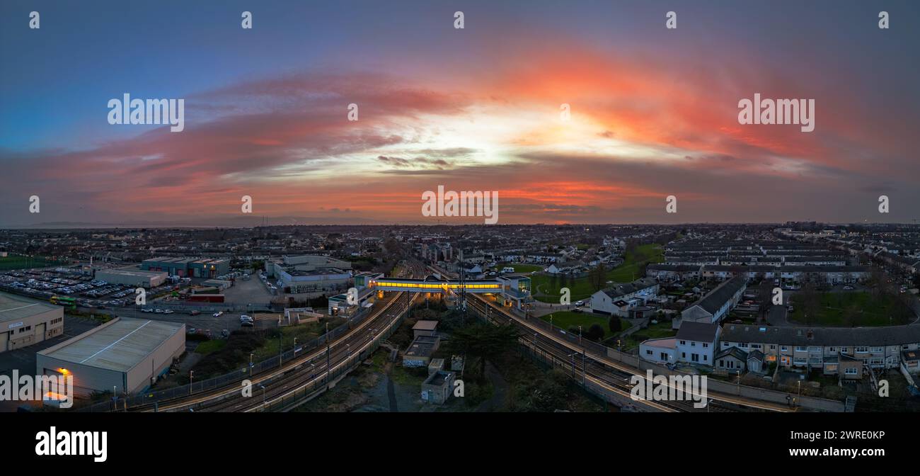 Muted red sky at night over Howth Junction & Donaghmede Stock Photo - Alamy