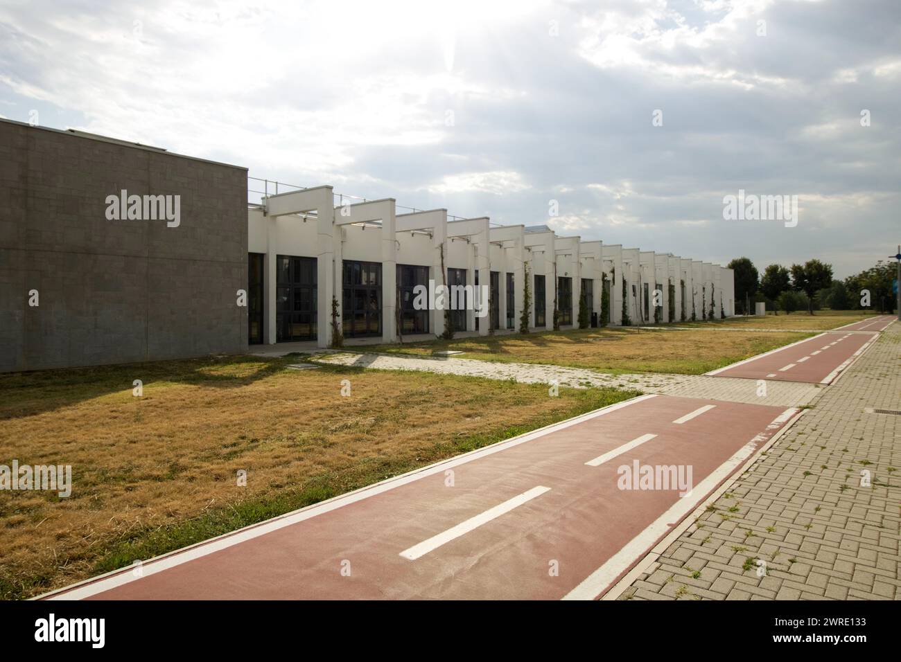 exterior building of Parma university campus with bicycle lane Stock Photo