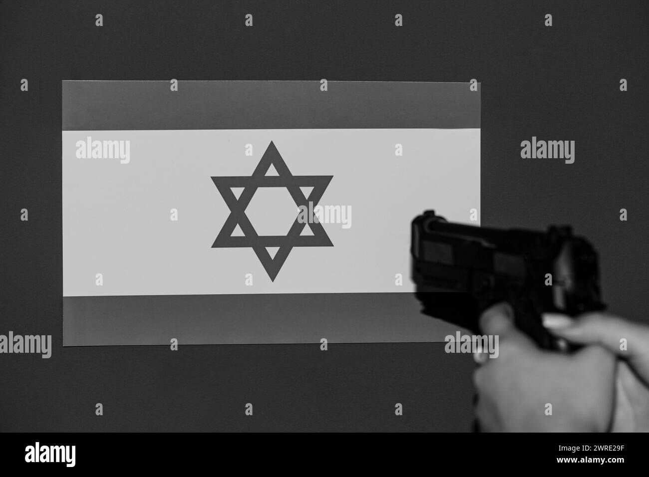 Flags of Israel and Palestine painted on cracked wall background. Concept of the Conflict between Israel and the Palestinian Authorities. High quality Stock Photo
