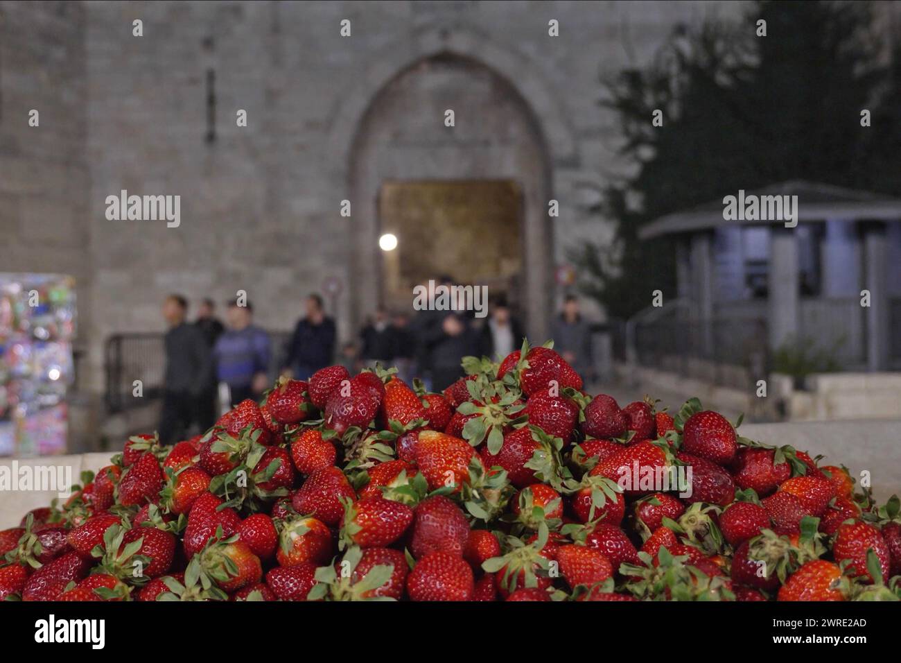 Pile of strawberries outside Damascus Gate in the old city Jerusalem Israel Stock Photo