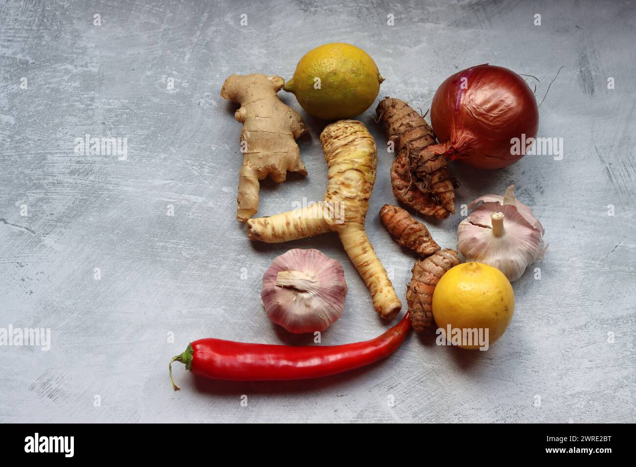 Boosting immune system concept. Herbal remedy ingredients on a table ...