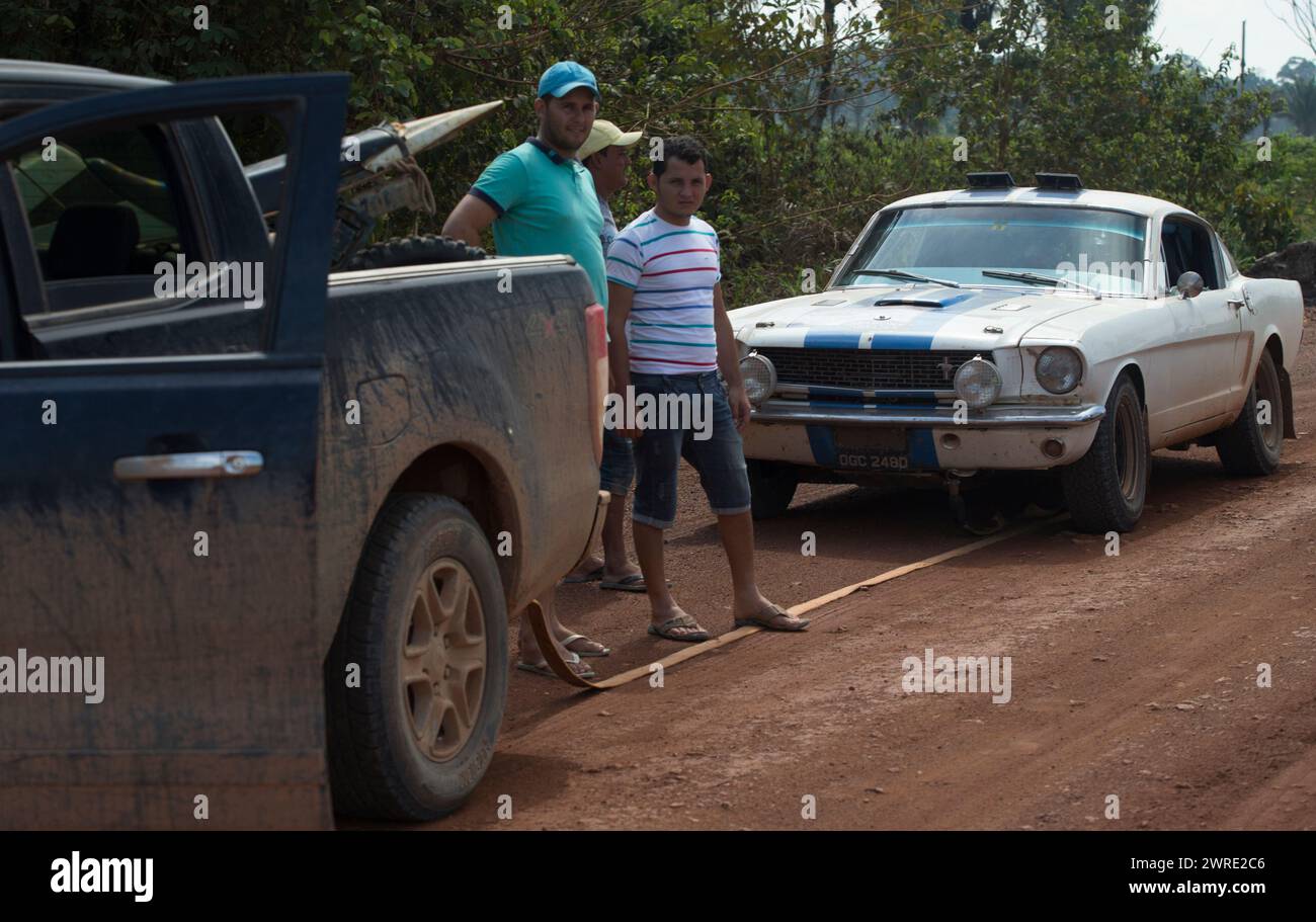 10/10/15.  A Ford Mustang from Atlantic to Pacific on the Tranz Amanonica Highway in the Amazon rainforest  - thought to be the first car of its type Stock Photo