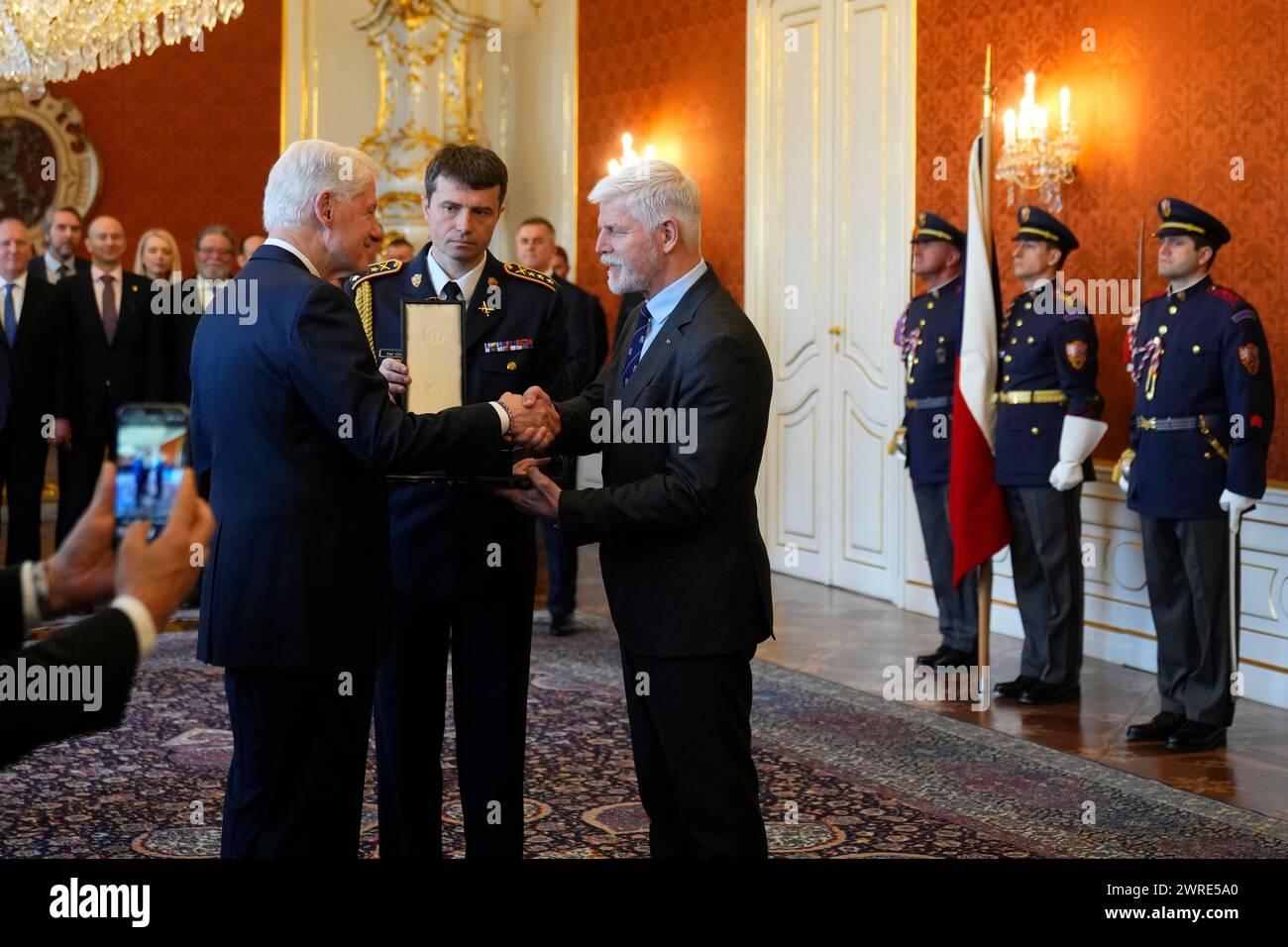 Czech President Petr Pavel, right, awards former U.S. President Bill ...