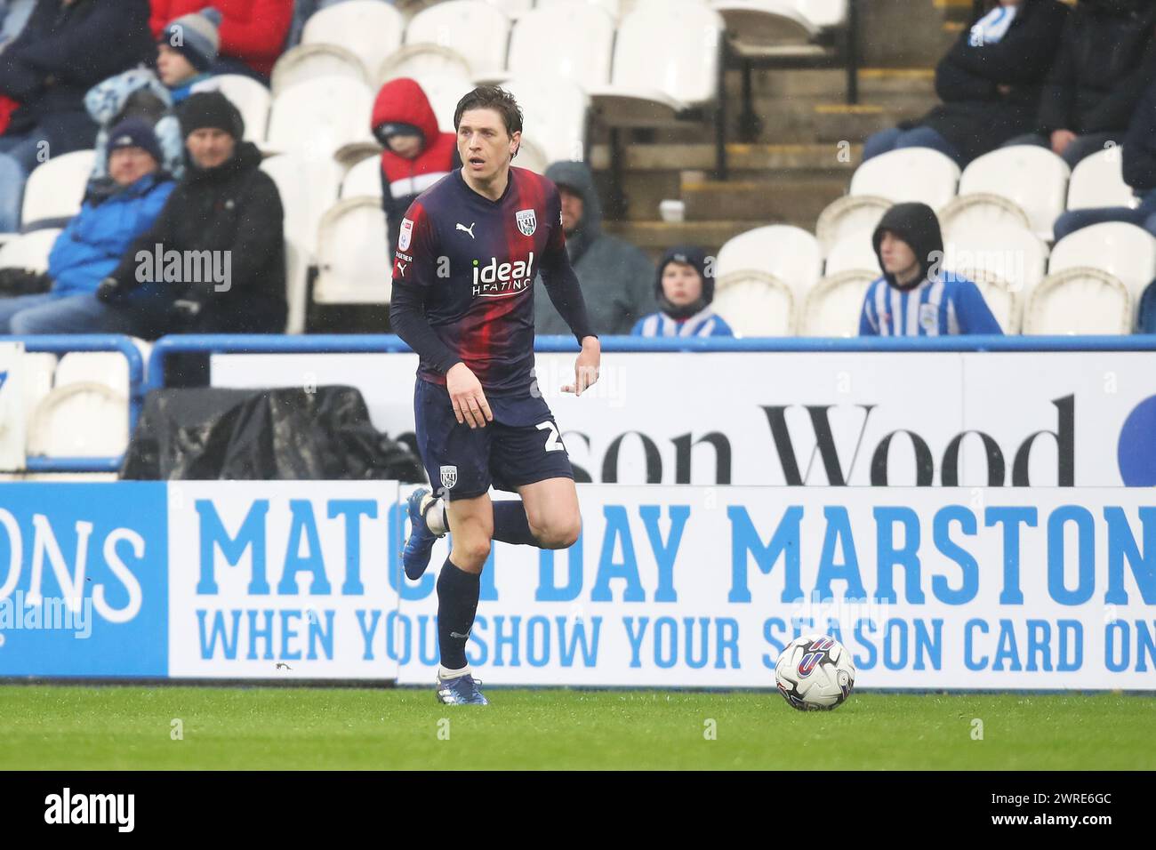 Huddersfield, UK. 11th Mar, 2024. West Bromwich midfielder Adam Reach ...