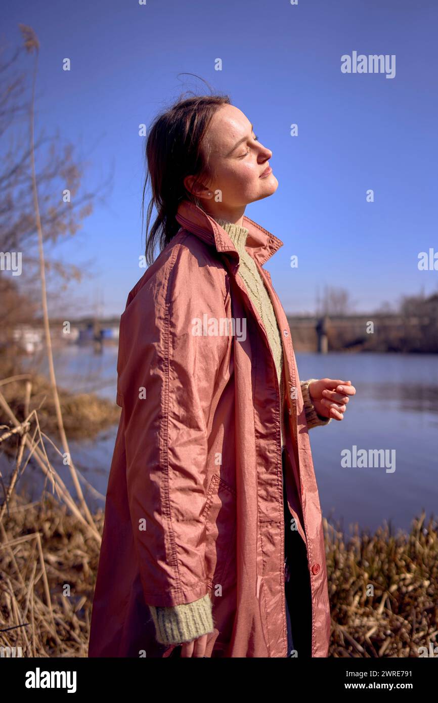 a portrait of a beautiful young woman on the river bank Stock Photo - Alamy