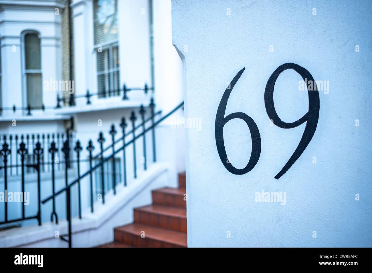 House number 69- residential building number Stock Photo