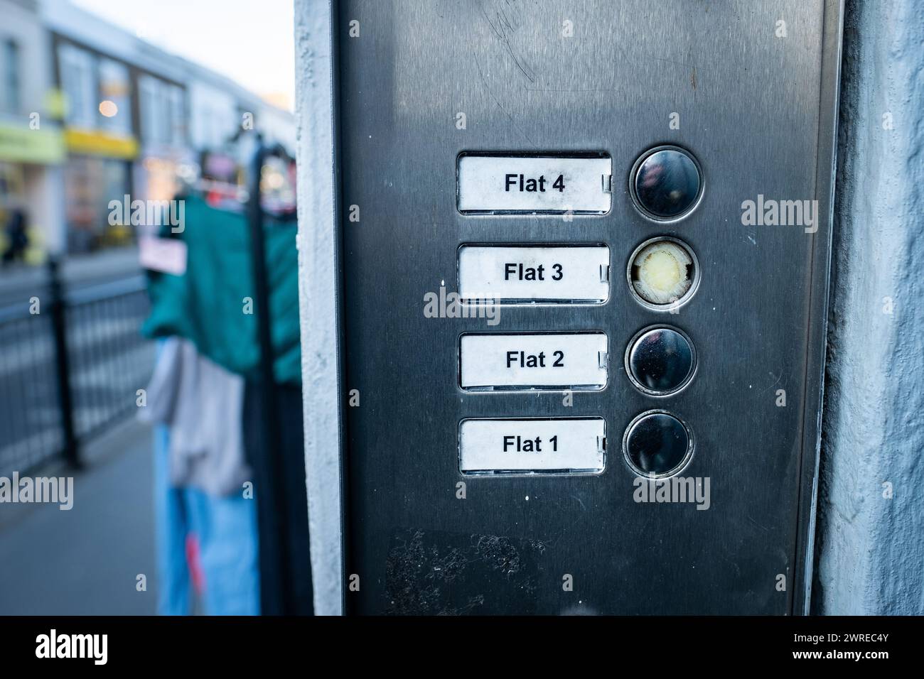London street flat / apartments. Door entry system showing flat numbers and buttons Stock Photo