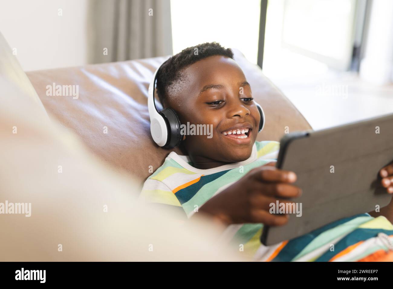 African boy wearing wireless hi-res stock photography and images - Alamy