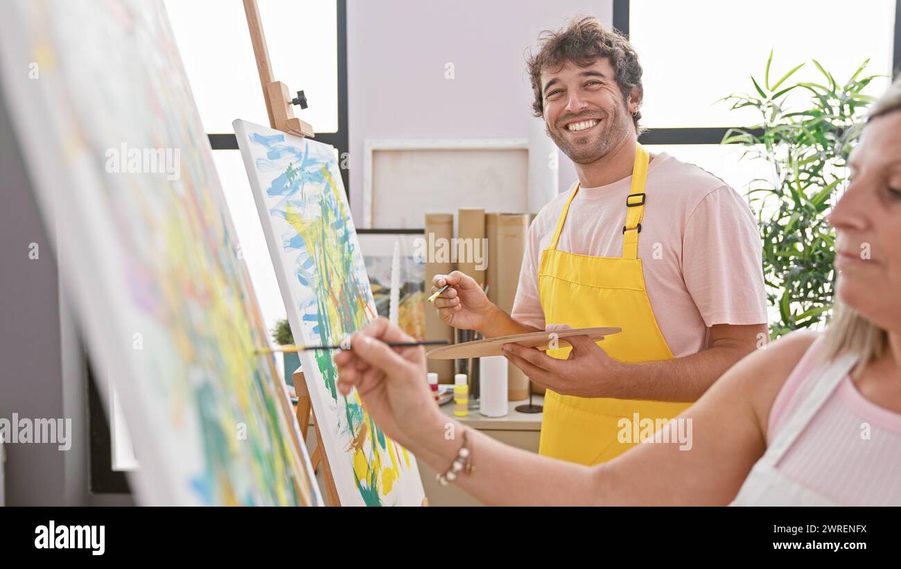 Two artists drawing together hi-res stock photography and images - Alamy