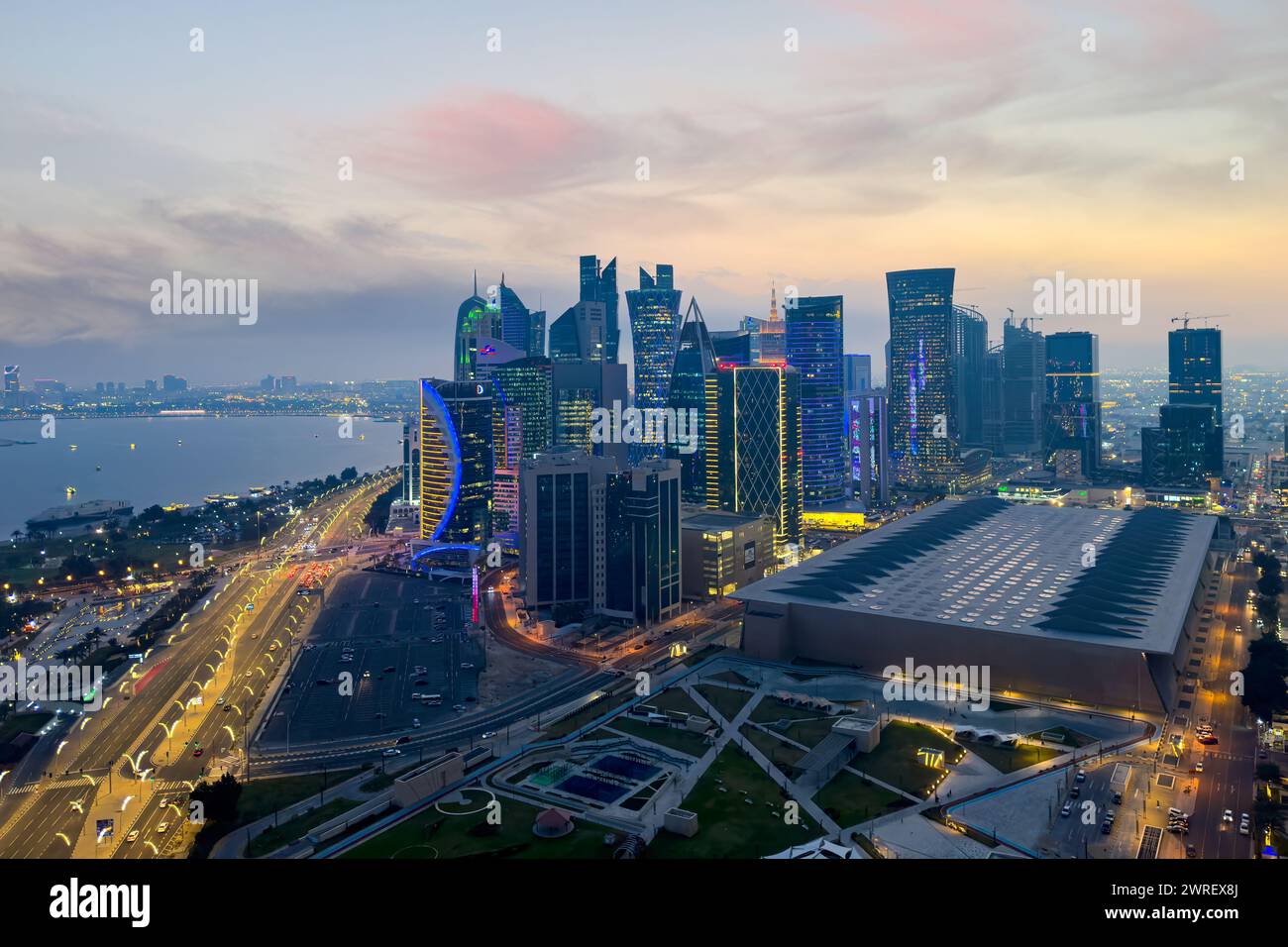 The skyline of Doha, Qatar during sunset Stock Photo