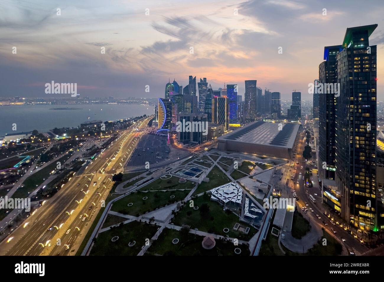 The skyline of Doha, Qatar during sunset Stock Photo