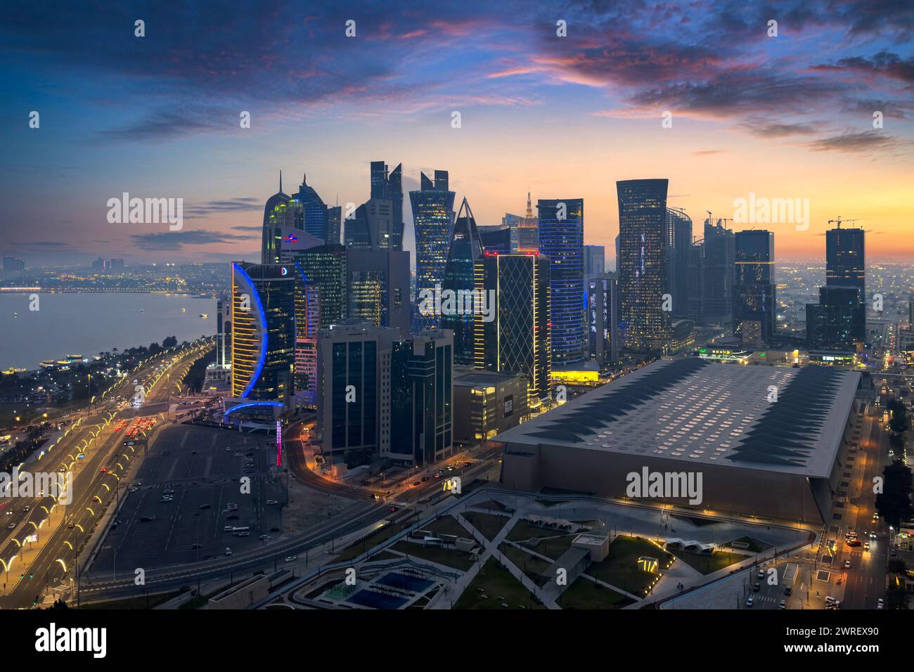 The skyline of Doha, Qatar during sunset Stock Photo