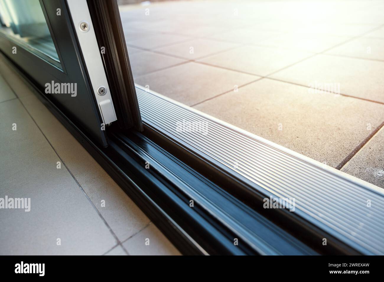 closeup of aluminum frame sliding terrace door system Stock Photo