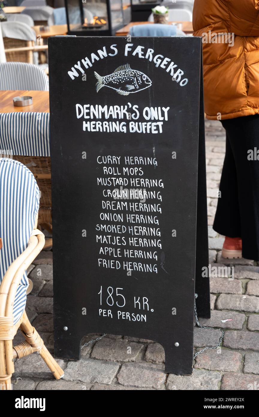 Sign for Nyhavns Faergekro, Denmark's only Herring buffet, which sells a variety of flavoured Herring dishes Stock Photo