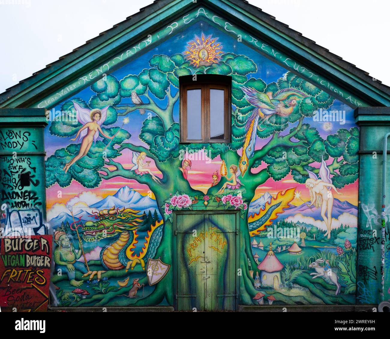 Graffiti mural on the wall of the entrance to Freetown Christania, in