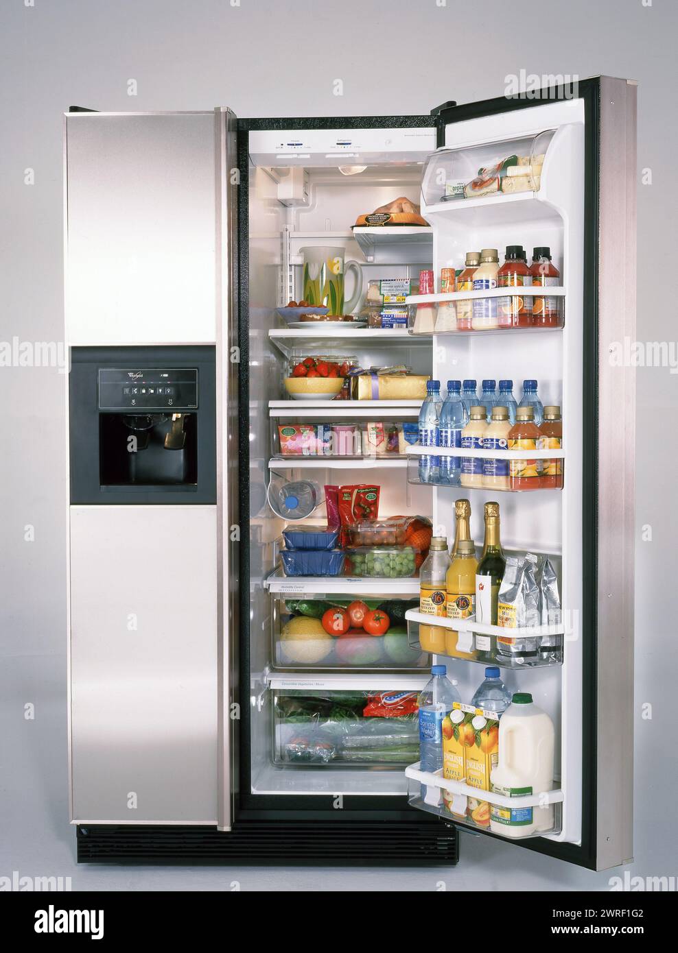 Large Family Freezer/Deep freeze with it's food contents Stock Photo