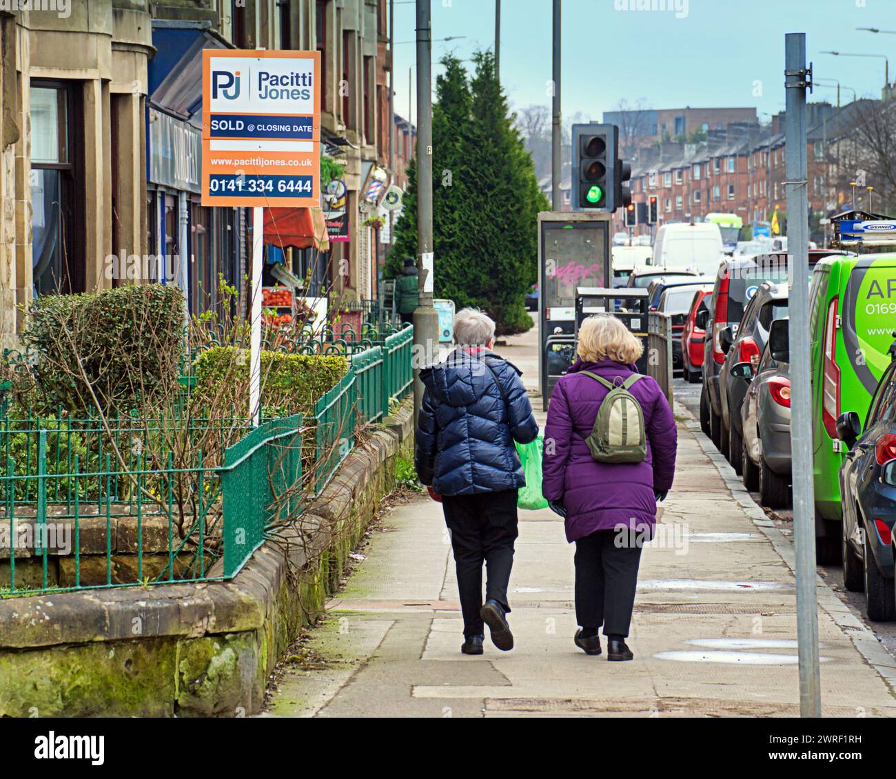 Glasgow, Scotland, UK. 12th March, 2024: UK Weather:  Locals on dumbarton road. Cloudy in the city saw locals and tourists on the streets of the city centre. Credit Gerard Ferry/Alamy Live News Stock Photo