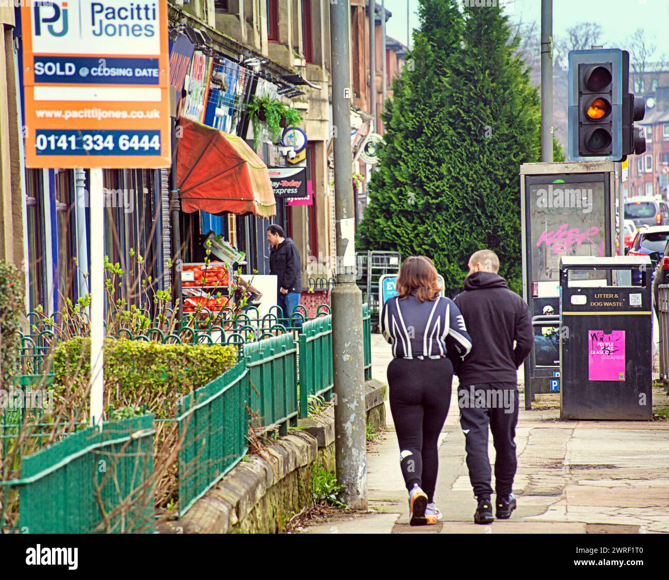 Glasgow, Scotland, UK. 12th March, 2024: UK Weather:  Locals on dumbarton road. Cloudy in the city saw locals and tourists on the streets of the city centre. Credit Gerard Ferry/Alamy Live News Stock Photo