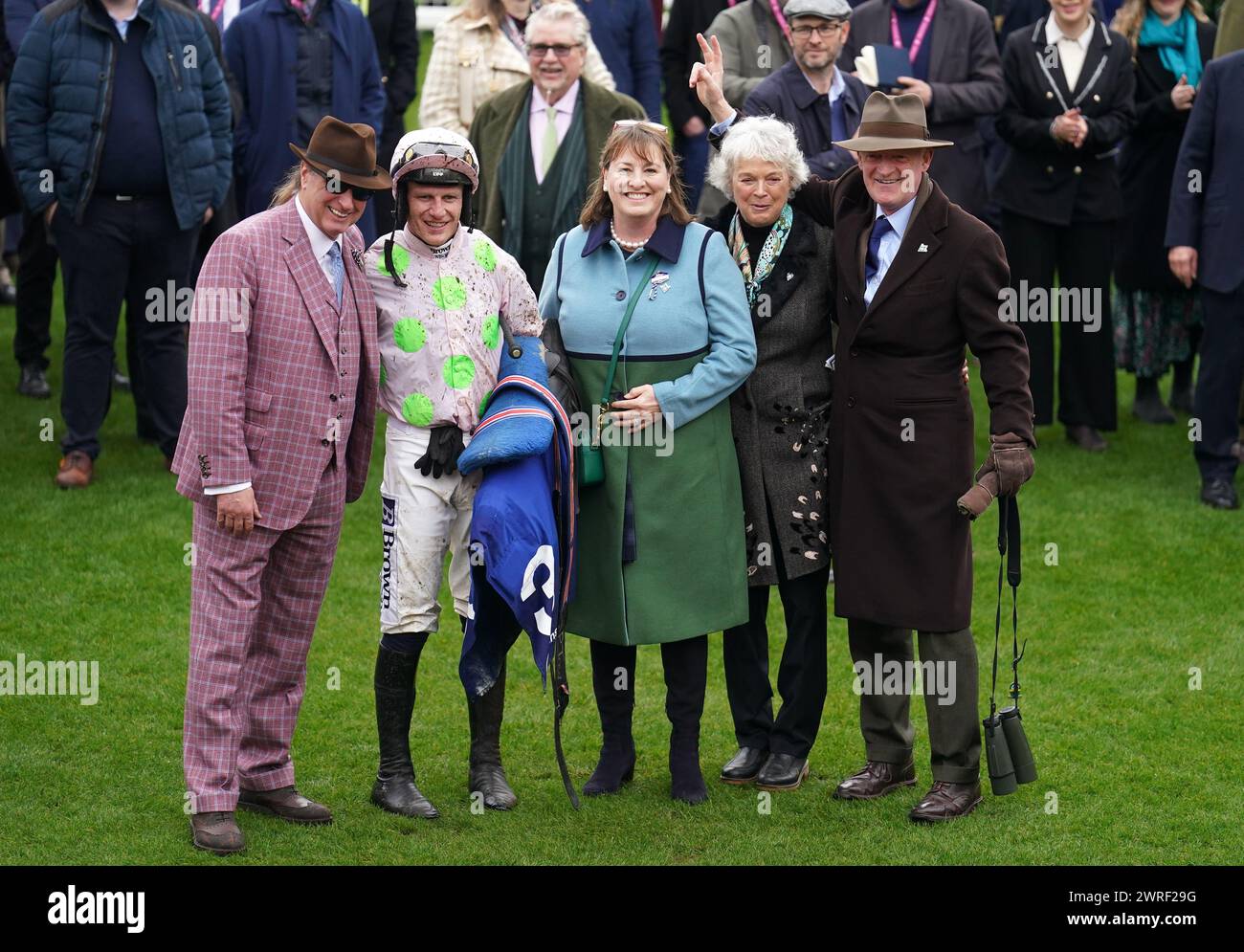 Left to right, Ricci Rich, jockey Paul Townend, owner Susannah Ricci, Jackie Mullins and trainer Willie Mullins after winning the My Pension Expert Arkle Challenge Trophy Novices' Chase with Gaelic Warrior on day one of the 2024 Cheltenham Festival at Cheltenham Racecourse. Picture date: Tuesday March 12, 2024. Stock Photo