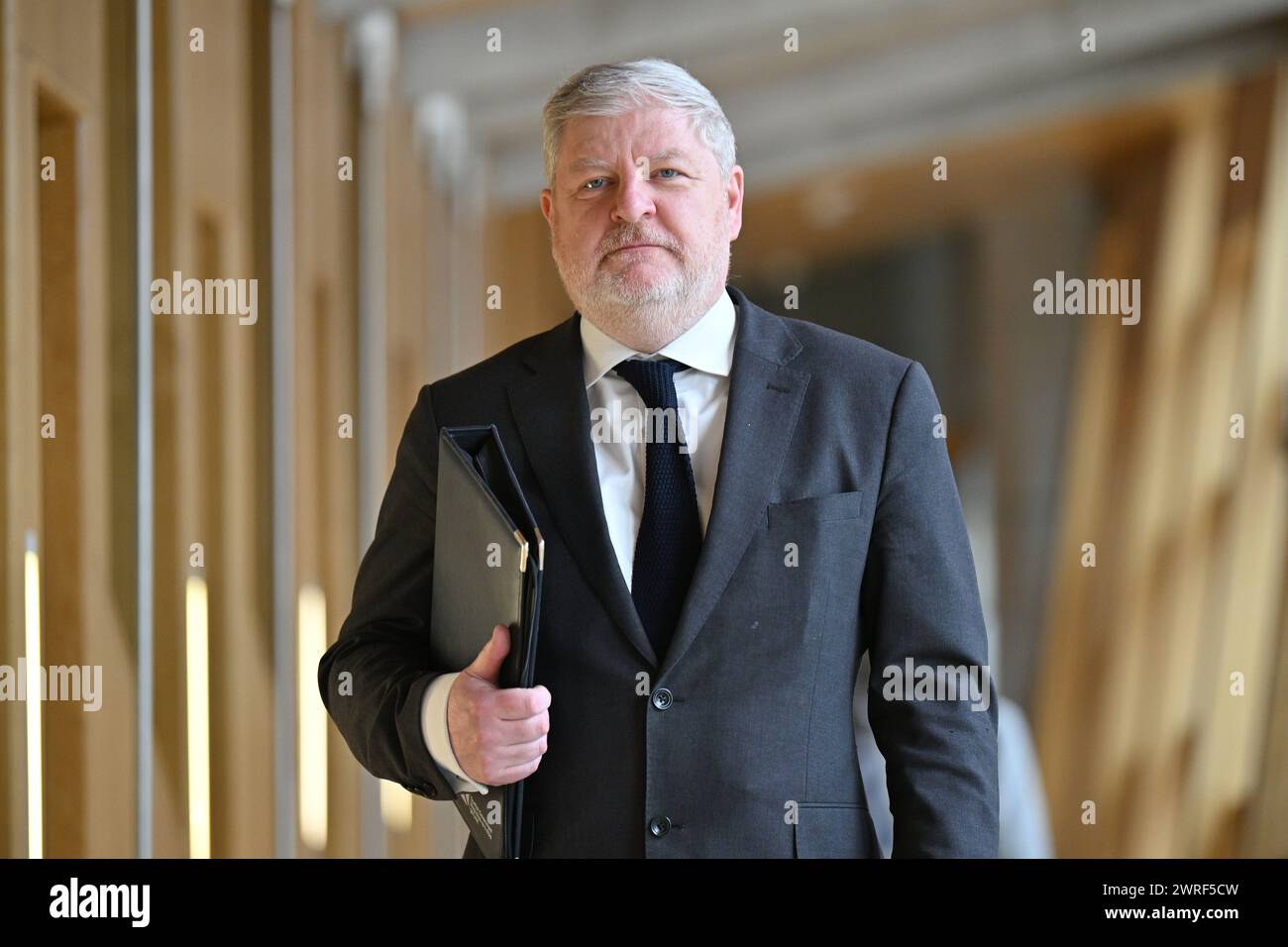 Edinburgh Scotland, UK 12 March 2024. Cabinet Secretary for Constitution, External Affairs and Culture Angus Robertson MSP at the Scottish Parliament to answer a  Topical Question on reports that Creative Scotland has awarded £85,000 to the project  Rein. credit sst/alamy live news Stock Photo