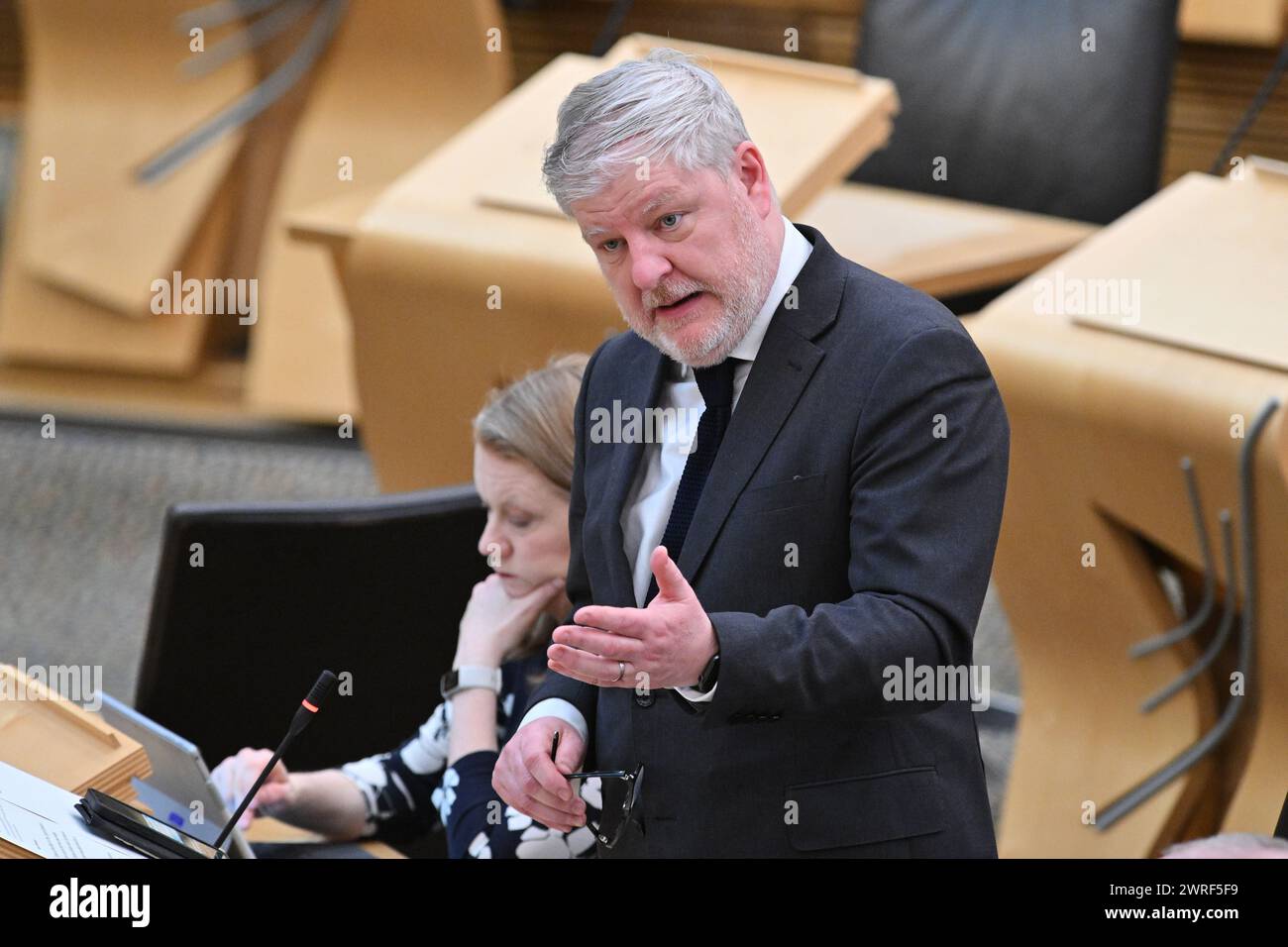 Edinburgh Scotland, UK 12 March 2024. Cabinet Secretary for Constitution, External Affairs and Culture Angus Robertson MSP at the Scottish Parliament to answer a  Topical Question on reports that Creative Scotland has awarded £85,000 to the project  Rein. credit sst/alamy live news Stock Photo