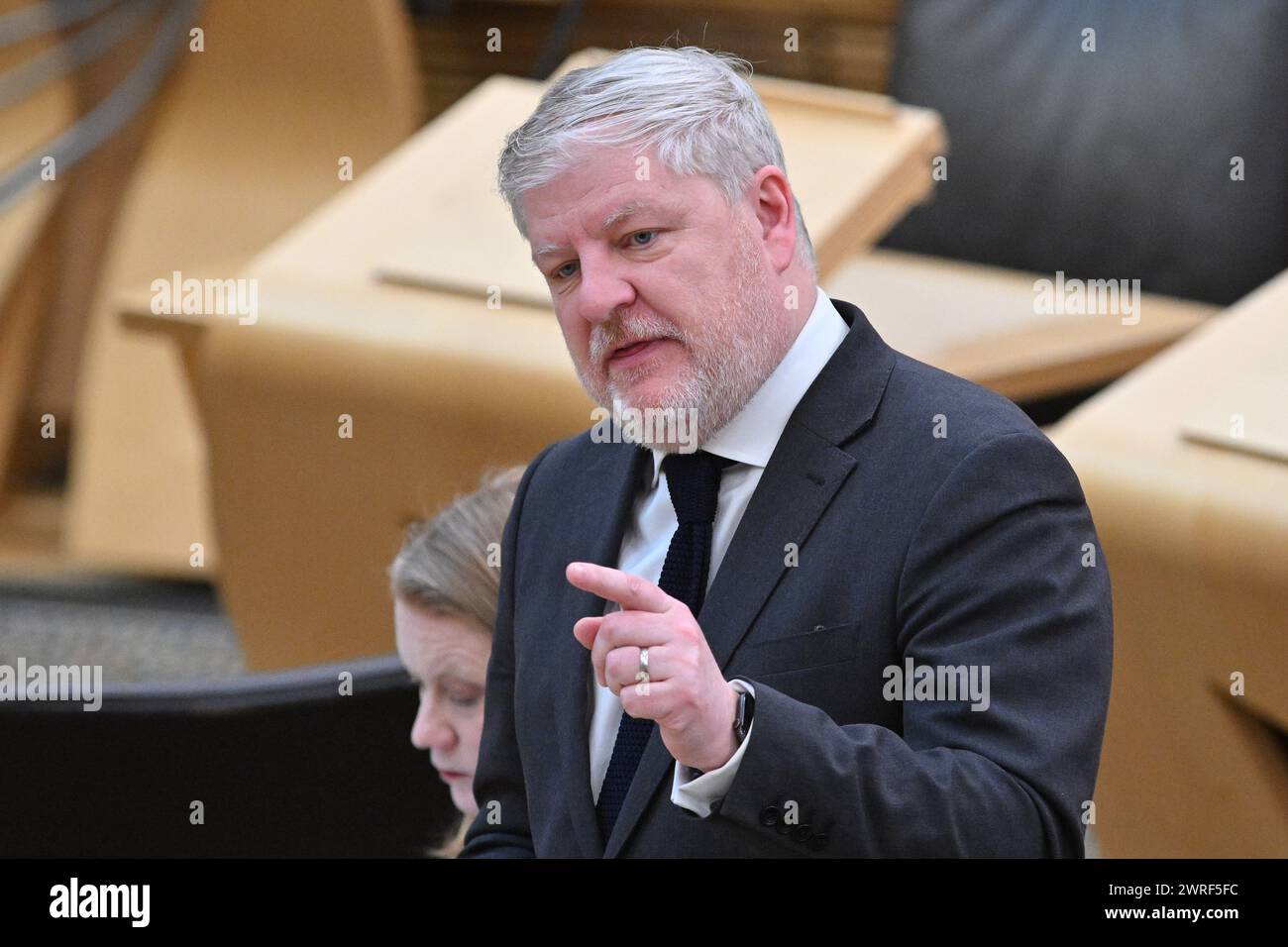 Edinburgh Scotland, UK 12 March 2024. Cabinet Secretary for Constitution, External Affairs and Culture Angus Robertson MSP at the Scottish Parliament to answer a  Topical Question on reports that Creative Scotland has awarded £85,000 to the project  Rein. credit sst/alamy live news Stock Photo