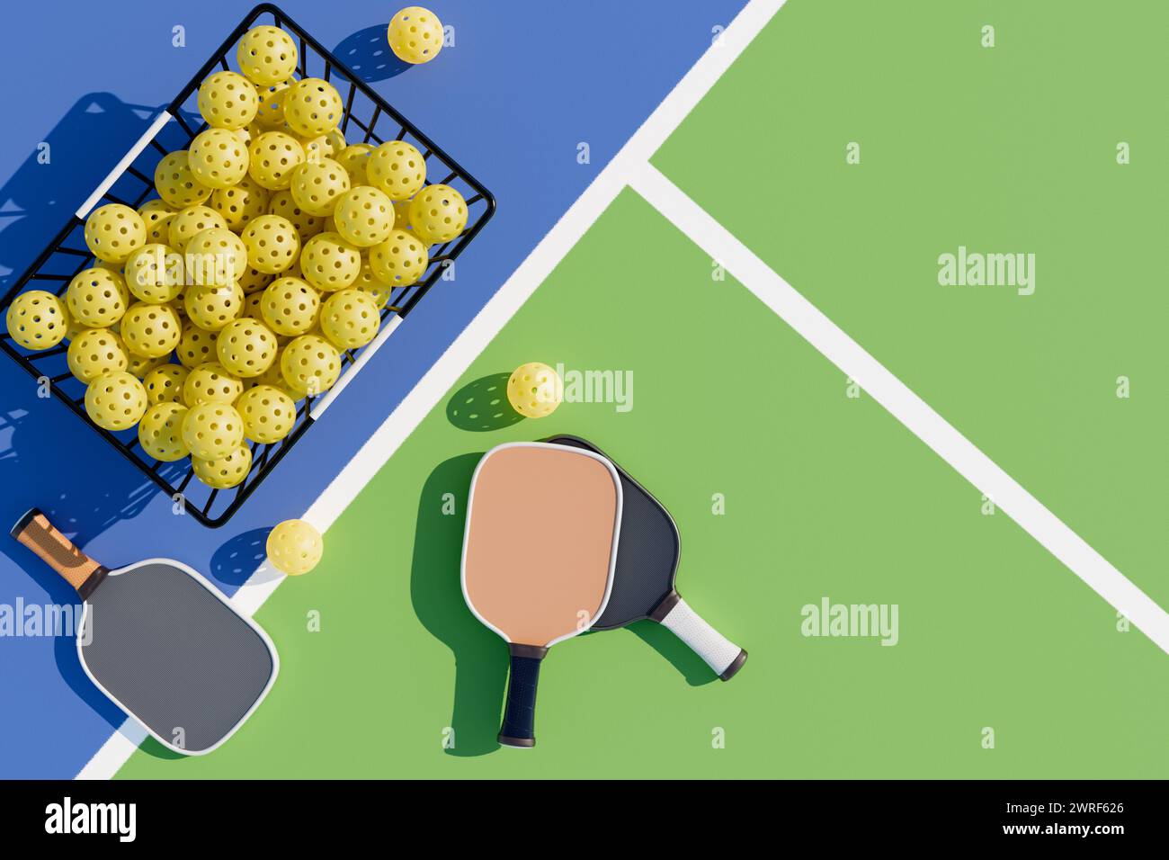Pickleball rackets and balls in a basket on a sports court. Top view 3D ...