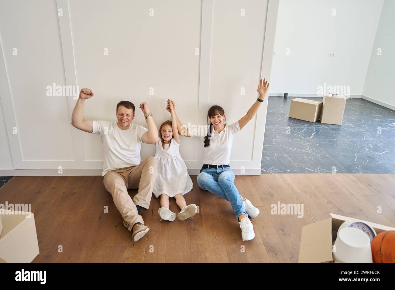 Family celebrating moving house hi-res stock photography and images - Alamy