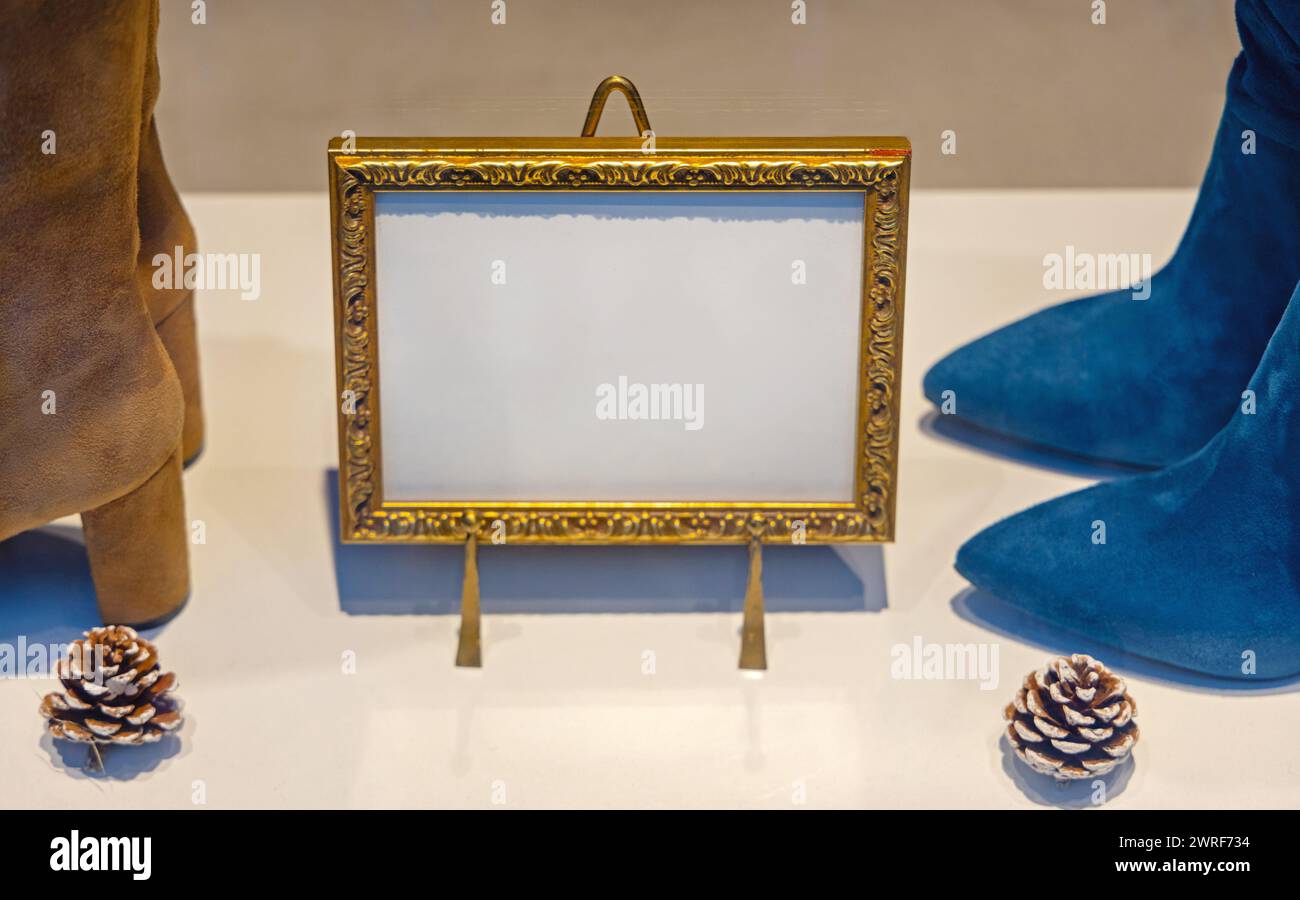 Empty Gold Frame Easel at Retail Shop Window Copy Space Stock Photo