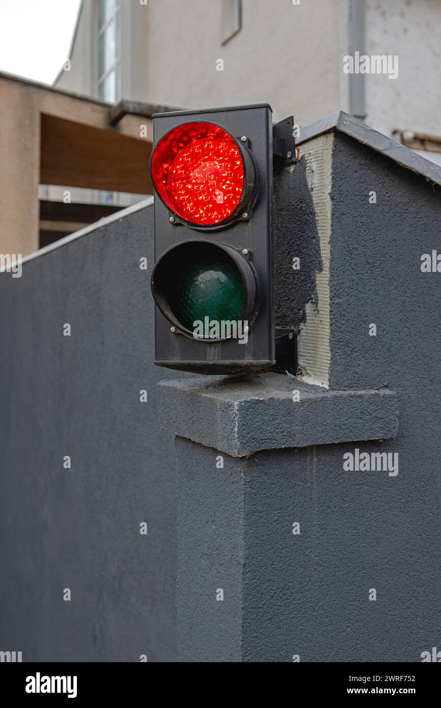 New Led Lamps Red Traffic Light Sign at Parking Garage Entrance Wall Stock Photo