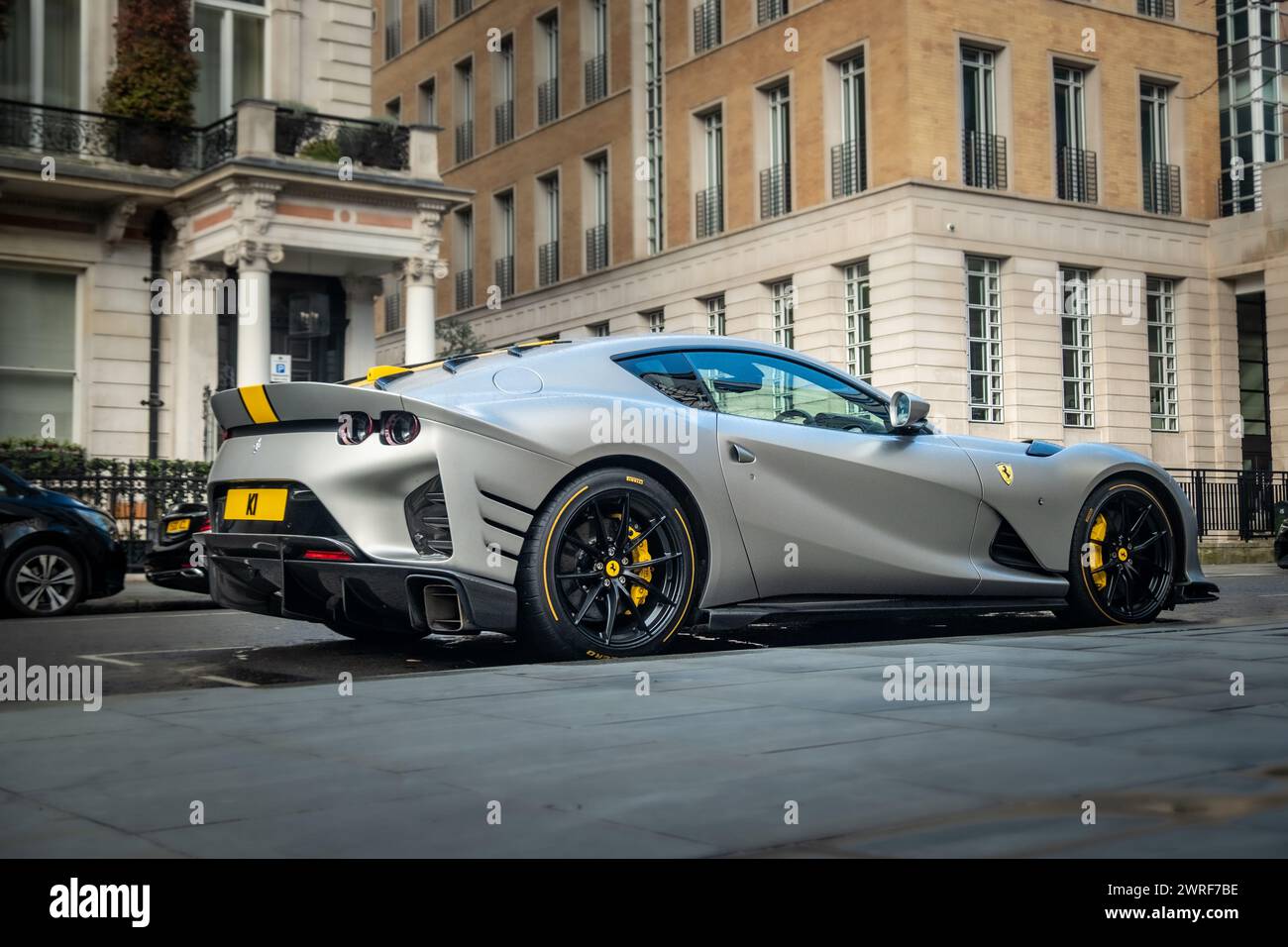 LONDON- FEBRUARY 19, 2024: Ferrari parked on upmarket London street in Belgravia Stock Photo