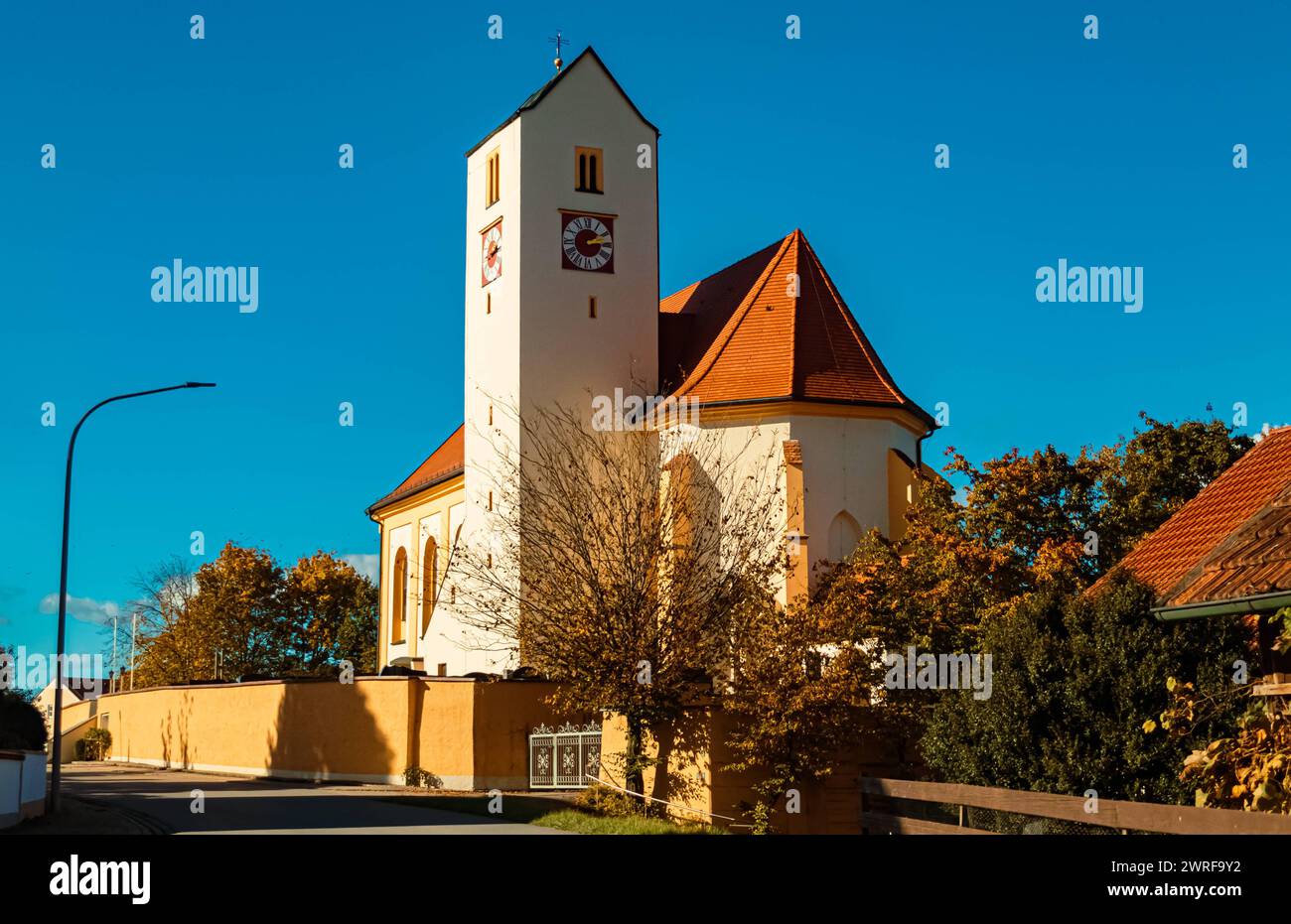 Church on a sunny autumn or indian summer day at Aholming, Deggendorf, Bavaria, Germany Aholming ba Stock Photo