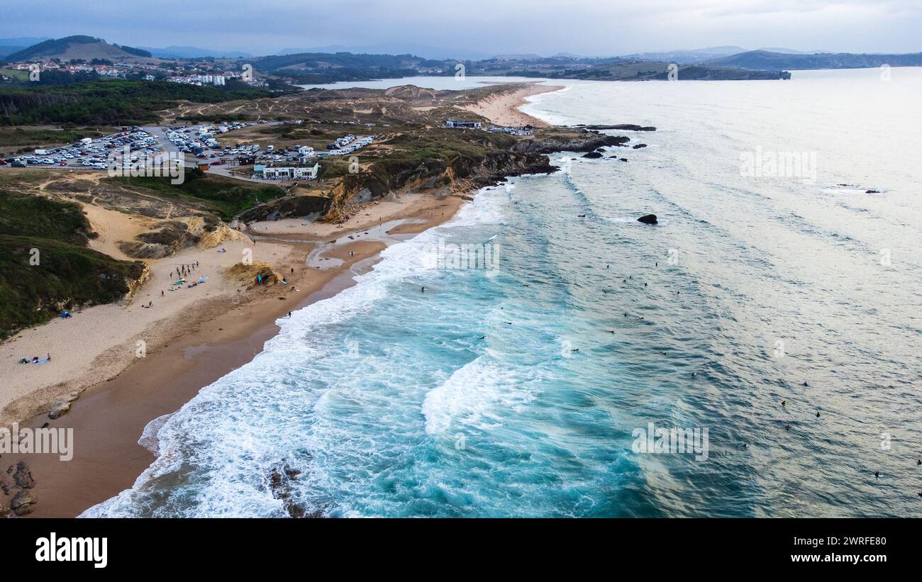 Open sea beach Playa de Canallave, windy and with strong currents, and the Cantabrian Sea with big powerful waves. Liencres Dunes Natural Park in the Stock Photo