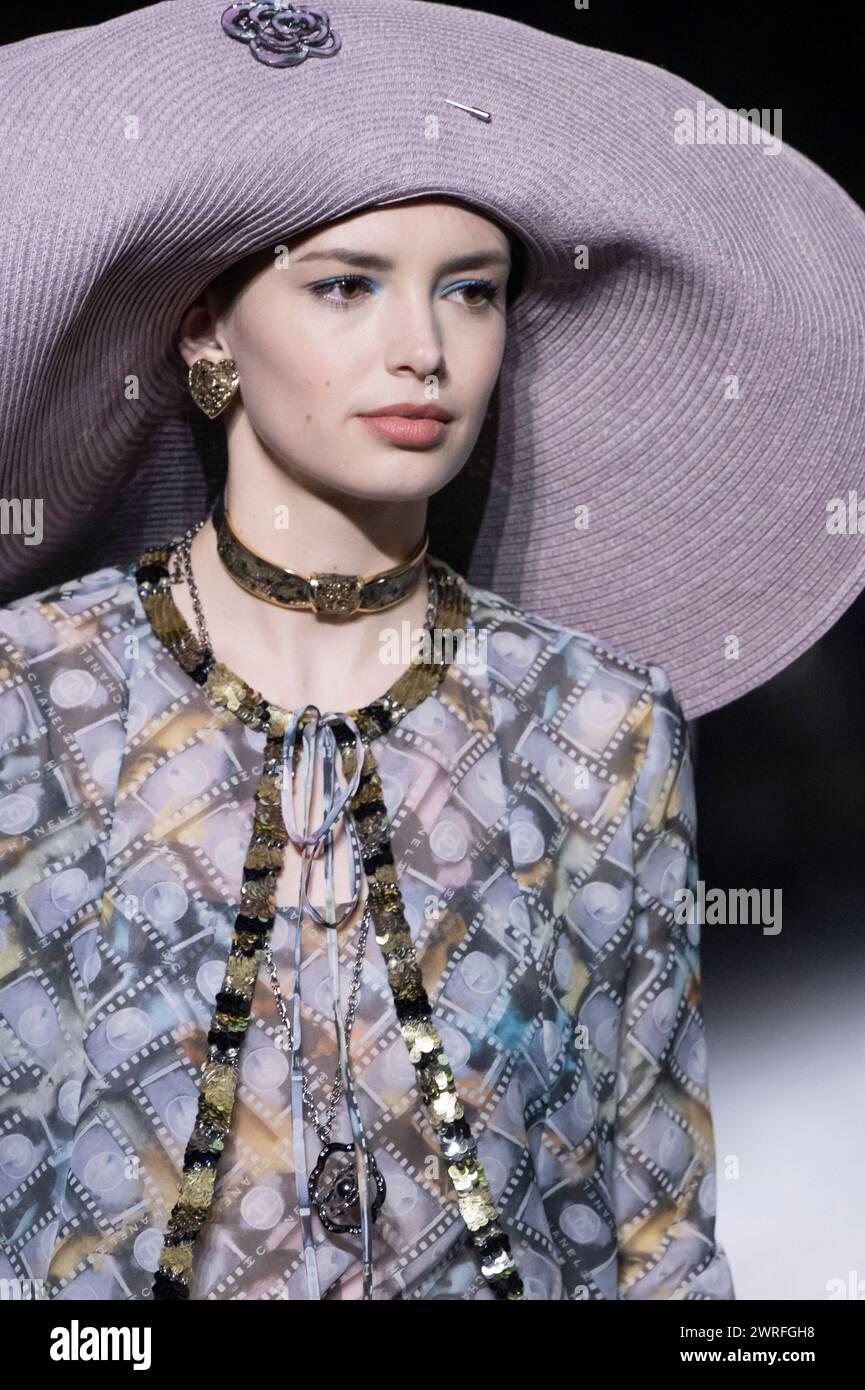 A model walks on the runway at the Chanel fashion show during the Fall ...