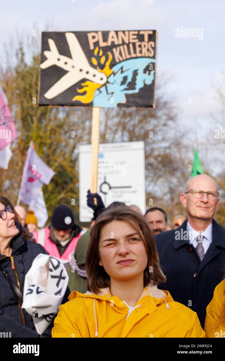 27th Jan 2024. Farnborough Airport, UK. 'Flying to Extinction' march and protest against private jets and airport expansion. Stock Photo