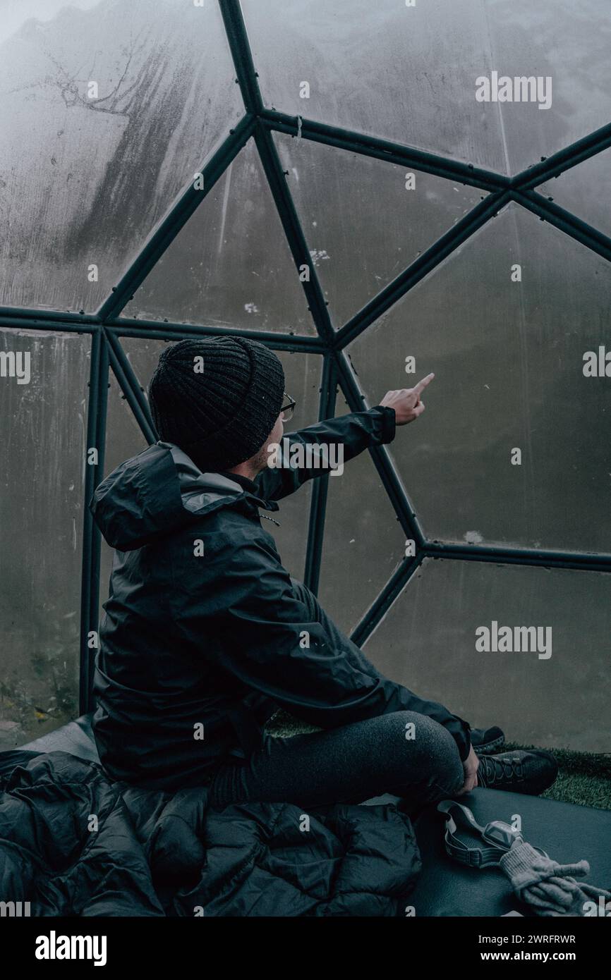 Hiker stays in eco dome while hiking in Peru Stock Photo