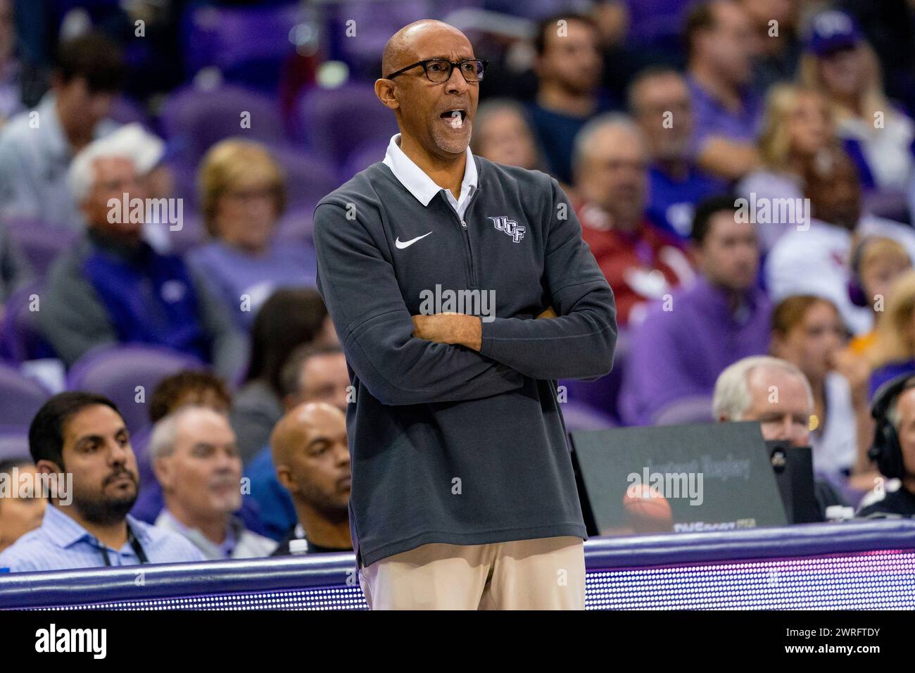 FORT WORTH, TX - MARCH 09: UCF Knights head coach Johnny Dawkins yells ...