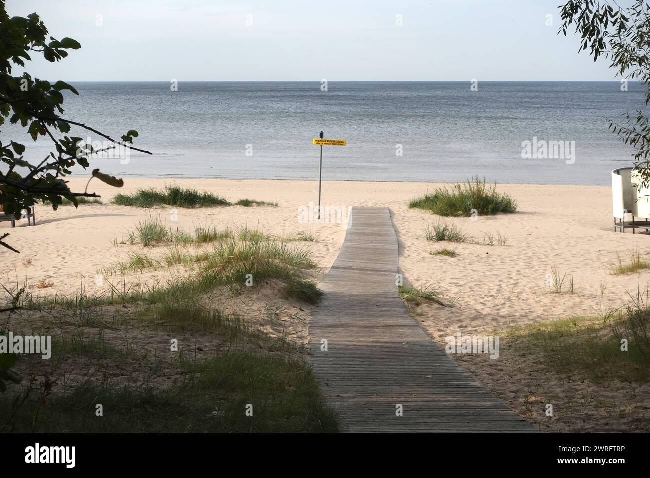 Wooden walk path to passive recreation area to the sandy beach on ...