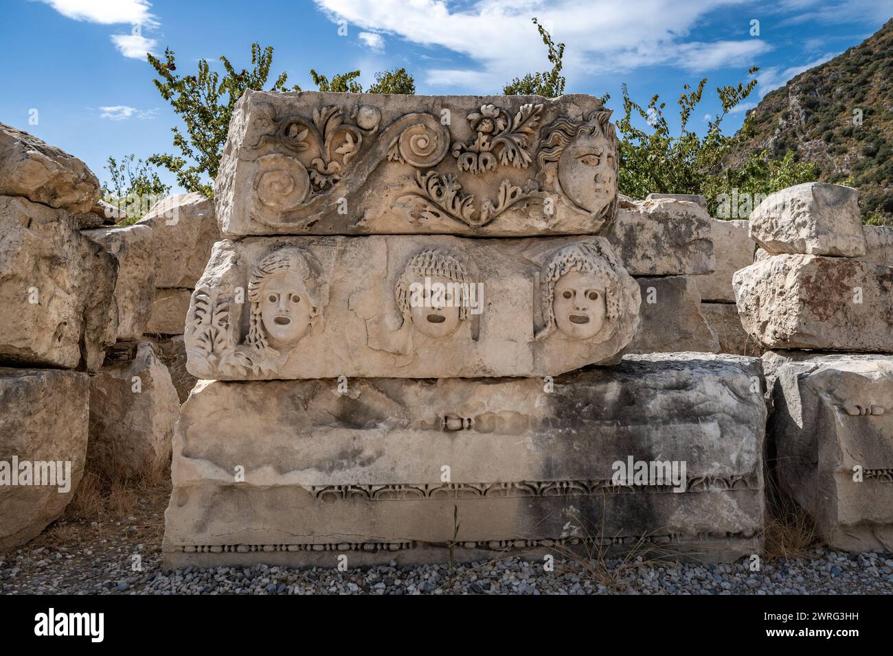 Stone masks at the ancient theatre of Myra in Demre, Antalya province of Turkey. Stock Photo