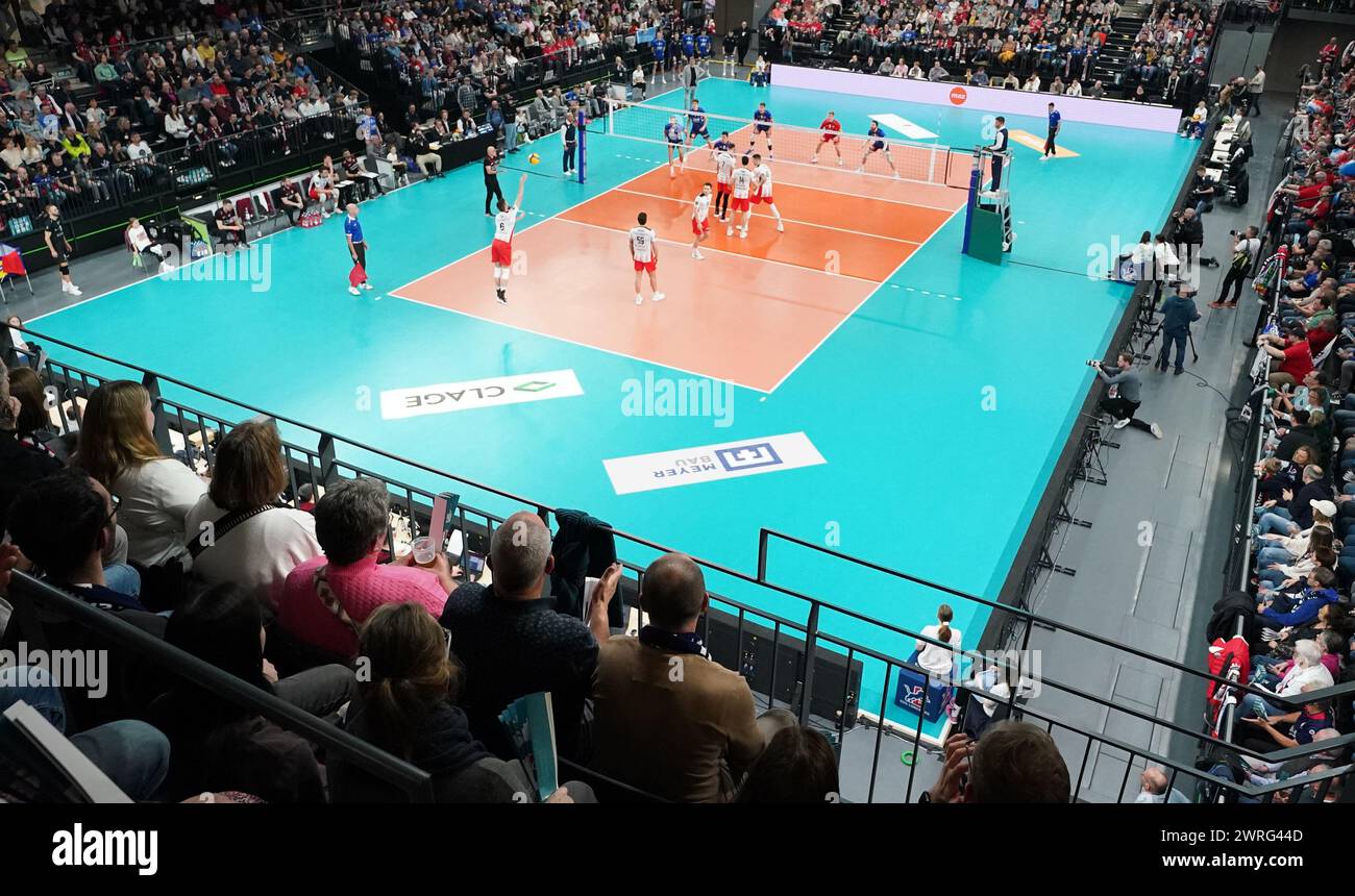 12 March 2024, Lower Saxony, Lüneburg: Volleyball, men: CEV Cup, SVG Lüneburg - Resovia Rzeszow, final, first leg, in the LKH Arena. Both teams in action. Photo: Marcus Brandt/dpa Stock Photo