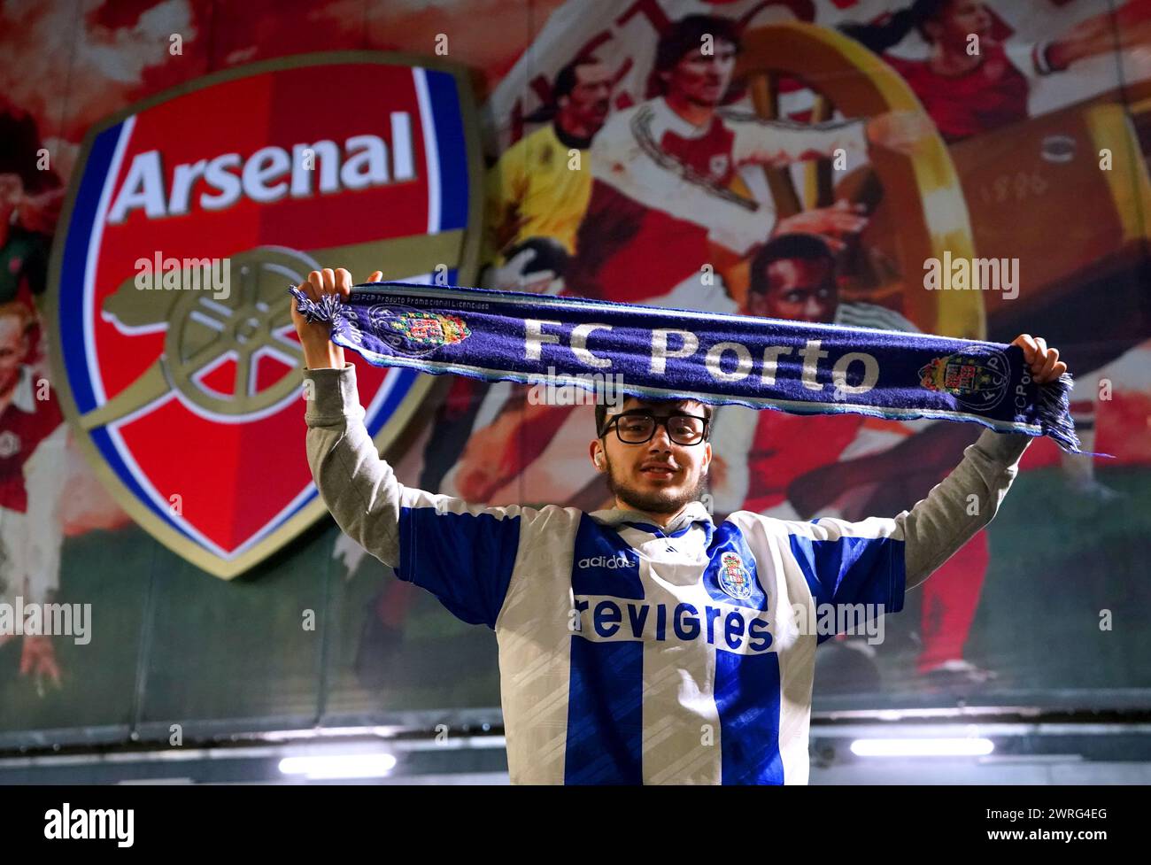 An FC Porto fan outside of the stadium ahead of the UEFA Champions League Round of 16, second leg match at the Emirates Stadium, London. Picture date: Tuesday March 12, 2024. Stock Photo