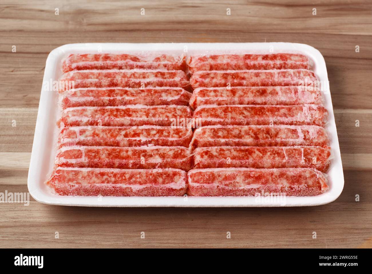 Package of frozen breakfast sausages with freezer burn Stock Photo Alamy
