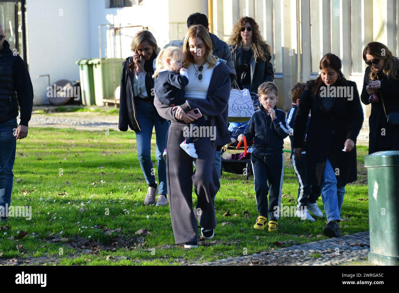 Milan, . 12th Mar, 2024. Claudio Mangiarotti rights copyright Milan - Chiara Ferragni's single life after returning from the United States, she spends the afternoon in the gardens of Parco Sempione with her children Leone and Vittoria, her mother Marina di Guardo. The opportunity to also celebrate the birthday of sister Francesca Ferragni and son Riccardo. Note the sculpted abs of Chiara Ferragni Ph Claudio Mangiarotti Credit: Independent Photo Agency/Alamy Live News Stock Photo