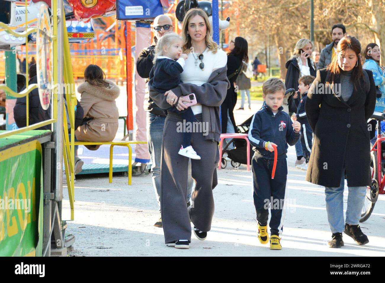 Milan, . 12th Mar, 2024. Claudio Mangiarotti rights copyright Milan - Chiara Ferragni's single life after returning from the United States, she spends the afternoon in the gardens of Parco Sempione with her children Leone and Vittoria, her mother Marina di Guardo. The opportunity to also celebrate the birthday of sister Francesca Ferragni and son Riccardo. Note the sculpted abs of Chiara Ferragni Ph Claudio Mangiarotti Credit: Independent Photo Agency/Alamy Live News Stock Photo