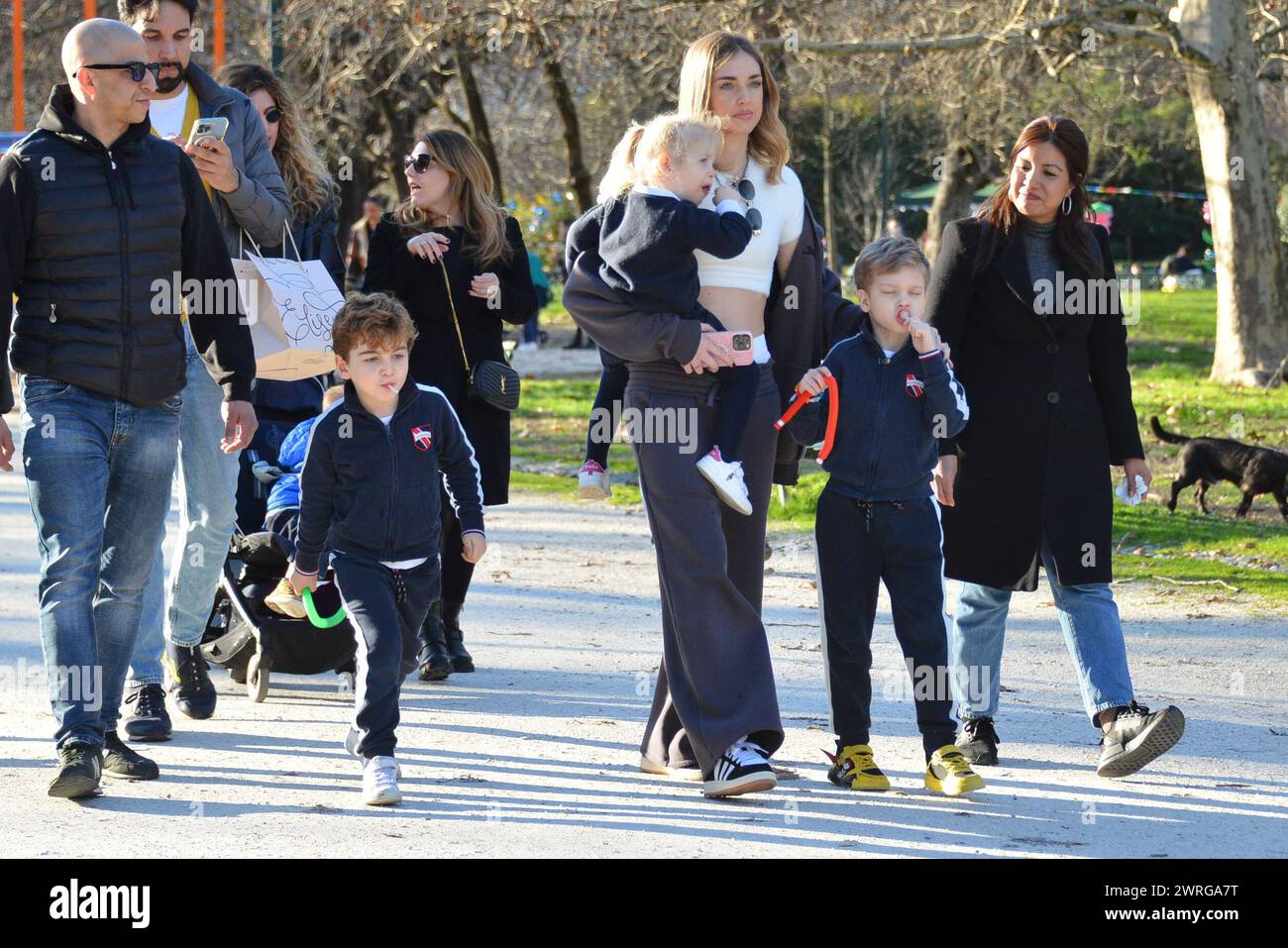 Milan, . 12th Mar, 2024. Claudio Mangiarotti rights copyright Milan - Chiara Ferragni's single life after returning from the United States, she spends the afternoon in the gardens of Parco Sempione with her children Leone and Vittoria, her mother Marina di Guardo. The opportunity to also celebrate the birthday of sister Francesca Ferragni and son Riccardo. Note the sculpted abs of Chiara Ferragni Ph Claudio Mangiarotti Credit: Independent Photo Agency/Alamy Live News Stock Photo