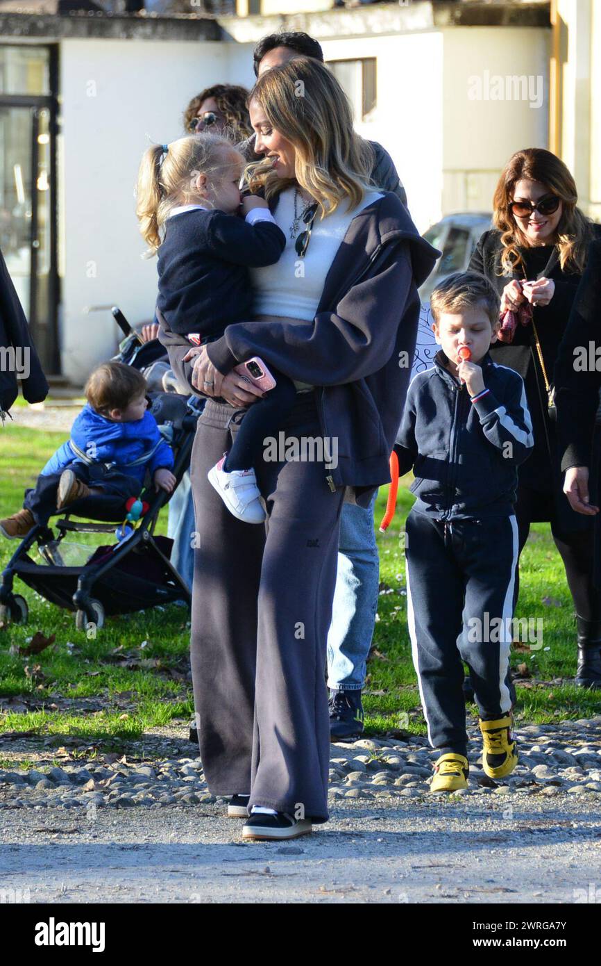 Milan, . 12th Mar, 2024. Claudio Mangiarotti rights copyright Milan - Chiara Ferragni's single life after returning from the United States, she spends the afternoon in the gardens of Parco Sempione with her children Leone and Vittoria, her mother Marina di Guardo. The opportunity to also celebrate the birthday of sister Francesca Ferragni and son Riccardo. Note the sculpted abs of Chiara Ferragni Ph Claudio Mangiarotti Credit: Independent Photo Agency/Alamy Live News Stock Photo